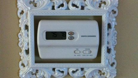 Disguise Ugly Thermostats with a Well-Placed Picture Frame