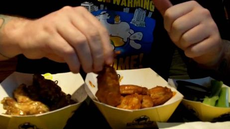 how to eat a chicken wing with one hand.