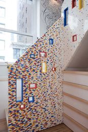 Using 20,000 LEGO Bricks, Artist Creates An Apartment’s Stair Railing