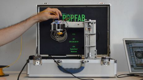 PopFab: a 3D printer and CNC milling machine that fits inside a briefcase