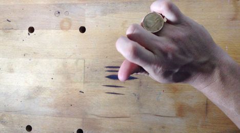 How to roll a coin across your knuckles [TECHNICALITIES]
