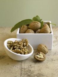 Whole walnuts and their extracted  oil improve cardiovascular disease risk