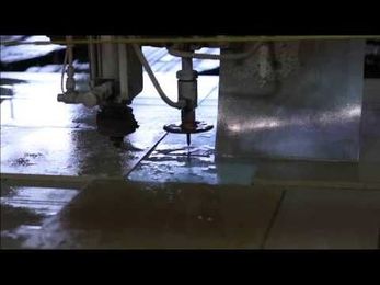 Waterjet machine cuts decorative glass