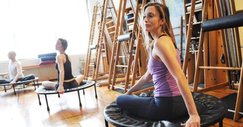 Trampoline workouts bounce off pounds