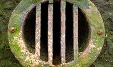How often are septic tanks emptied, and where do the contents go?