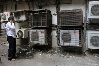 Global air-conditioning: Are we cooling our way to a warmer planet?
