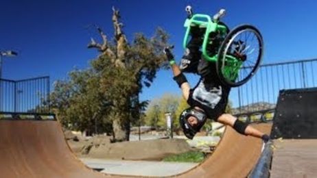 Inspiring guy uses his wheelchair to pull sweet skateboard tricks