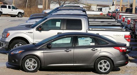 From car lots to city budgets, cheap oil means change