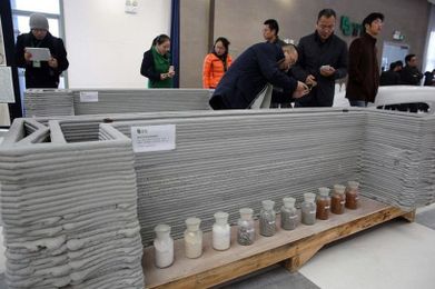 chinese-based winsun 3D prints six-story apartment & mansion buildings