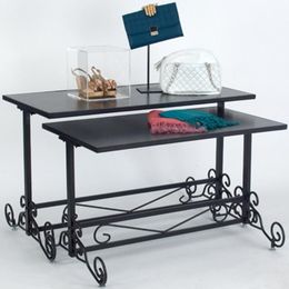 Add stylish tables for displaying merchandise to create cottage-style decor