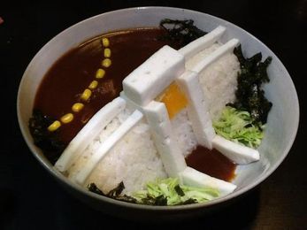 Do play with your food: "Dam curry rice" looks dam tasty to us!