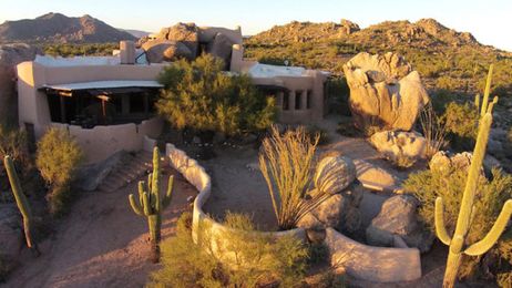 Look inside! Home built among boulders hits the market