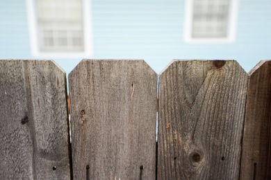 How to Apply a Lasting Stain to Your Wood Fence