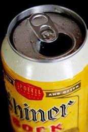 Wash your hair with Shiner Bock at Birds Barbershop