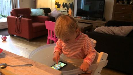 One year old plays with Philips Hue LED lights for the first time.