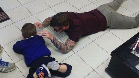 A Caring Barber Lies on Floor to Give Haircut to 4-Year-Old Autistic Boy