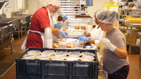 Soups and salads go from Epic Systems' cafeterias to food pantry shelves