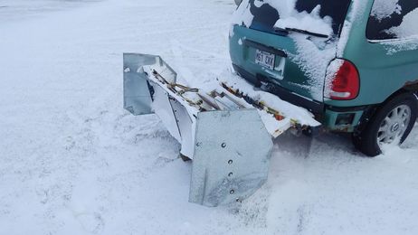 Canada man builds homemade snow plow to shovel his drive