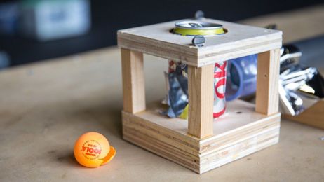 Destroying a Soda Can With a Ping-Pong Ball Using Science and a Vacuum Canon