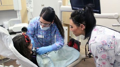 Dental pros, students work to ‘Give Kids a Smile’