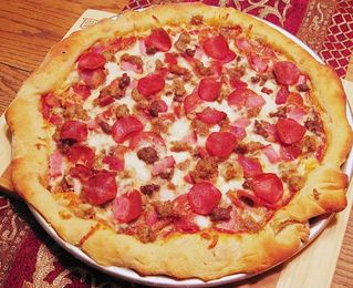 Save on calories by making this Pizza Hut-style pie at home