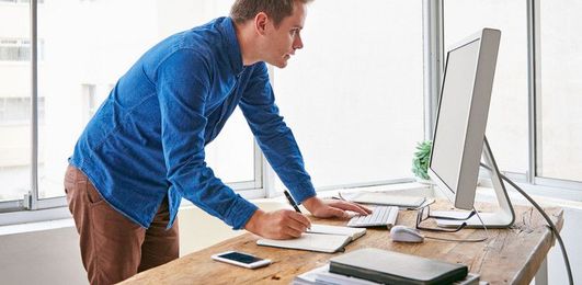 What People Who Love Sitting Should Know About Using a Standing Desk