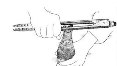 Use Kitchen Tongs to Open a Beer Bottle in a Pinch