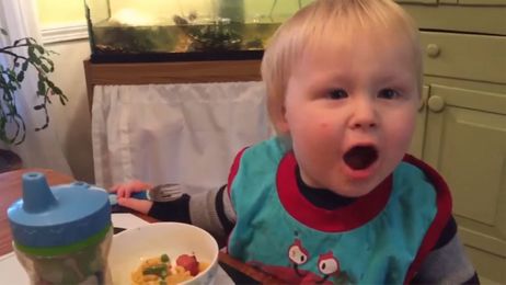 Watch this adorable toddler try to find the 'missing' fork hiding in his hand