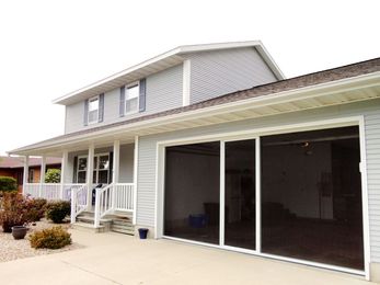 Get Ready To Host A Graduation Party By Putting a Screen on your Garage Door