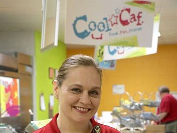 By Eating Her Own Cafeteria Food!