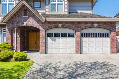 What to Do If Your Home's Garage Door Goes Up and Down By Itself