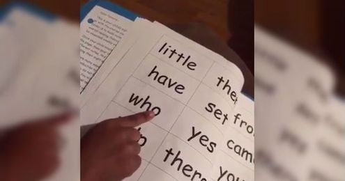 Little girl struggles to read the word 'who' and still just can't