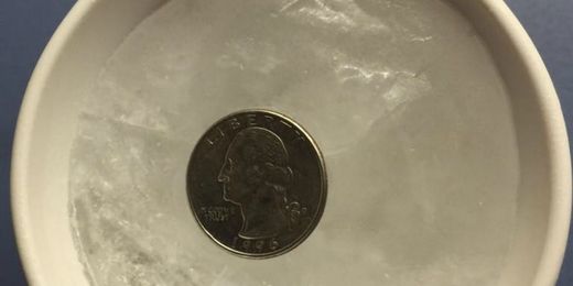 You Should Always Put a Quarter on a Frozen Cup of Water Before a Snowstorm