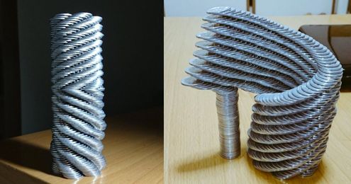 Precisely Stacked Coin Towers That Defy Gravity
