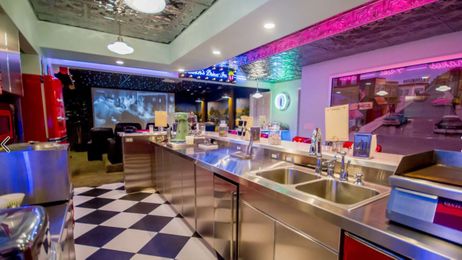 Coolest basement ever! Couple creates '50s-inspired diner and theater