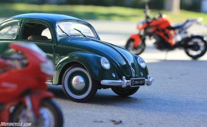 Duke’s Den: Motorcycles and Cars