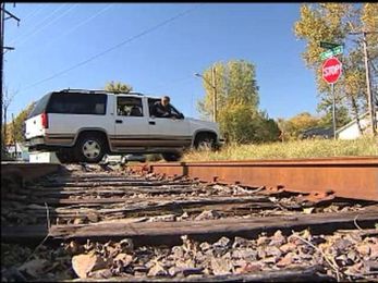 Stalled on the tracks? Get out now, get away.