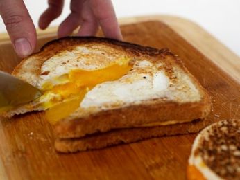 Eggs-in-a-Hole + Grilled Cheese = Grilled Cheese Eggsplosion!