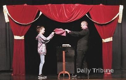 Magician Crews uses magic  tricks to teach kids about literature
