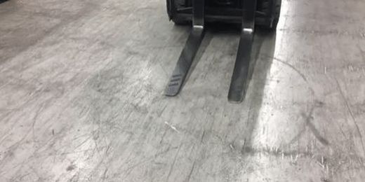 Watch an Amazing Forklift Operator Pick Up a Quarter 