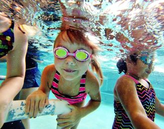 NEW: Teach kids to swim and watch them near water, safety groups say