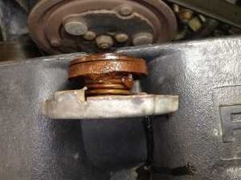 What causes rust in a cooling system?