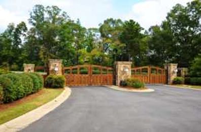 Do You Want to Improve Your Home’s Curb Appeal? Consider a Custom Driveway Gate