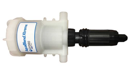 Water-driven pump to clean or sanitize various water lines