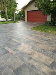 Tile Isn't Just for Showrooms, It's for Your Garage & Driveway Too