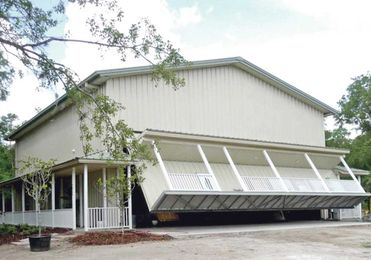 Hydraulic shop doors make closure simple