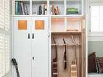 Custom Craftsman Cabinetry Fit for a Guitar Collector (4 photos)