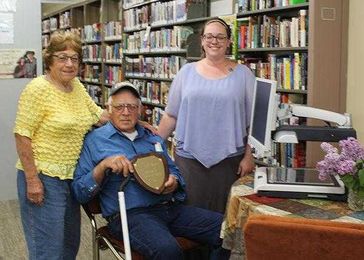 Brauns donate electronic magnifier to Newell library
