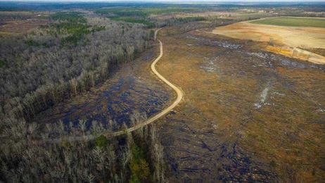 Neighbors want to stop mega-farms from guzzling water. But farms have powerful allies