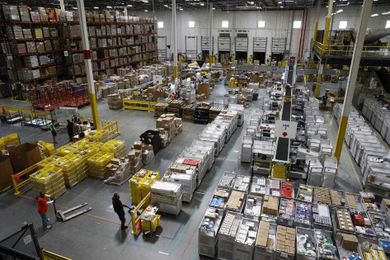 Ripple effect? Amazon's $15 wage may help lift pay elsewhere